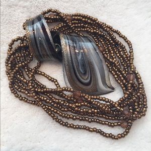 Glass work necklace.